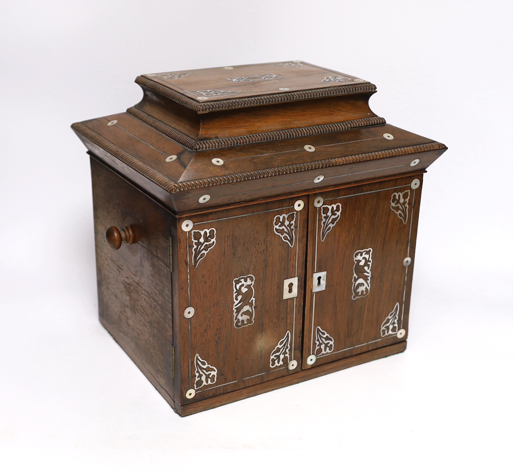 A William IV rosewood and cut mother of pearl table top sewing cabinet, 27cm, high, 28cm wide, 23.5cm deep